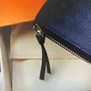 M60169 Cartera con cremallera CLEMENCE de cuero Empreinte de calidad superior para mujer Cartera con cremallera larga Titulares de tarjetas con cremallera Monederos Carteras para mujer 60169