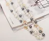 Fashion designer luxury classic style hollow roses elegant multi colors bright pearls long sweater statement necklace for woman