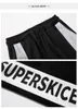 Mäns Casual Pants Side Stripe Letter Printing Men Joggers Sweatpants Hip Hop Man Svart Sweat Pant Slim Monterad Byxor USA Storlek 4sets / Lot