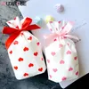 10 stücke Herz Runde Dot Kordelzug Taschen Bogen-knoten Kunststoff Verpackung Tasche Mini Geschenk Tasche Süßigkeiten Back Paket Liefert großhandel