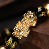 Pulseira de riqueza de obsidiana preta, pulseira de liberação ajustável de energias negativas com pulseira de amuleto rico de sorte dourada pi xiu 5777071