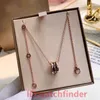 Nuovissimo argento moda oro rosa ceramica bianca gioielli di lusso donne diamante fiore ghiacciato perla croce Bzero1 collane da donna di design