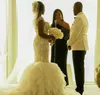 Shiny Luxury African Mermaid Wedding Dress Custom Cap Sleeves Major Beaded Wedding Dresses Tiered Ruffles Sweep Train Bridal Gowns Plus Size