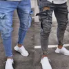 Novos Homens Denim Calças rasgadas Hole Calças de Jeans Moda Hip Hop Skinny Lápis Calças de brim para homens Estiramento Patchwork Bolso Cargo Calças