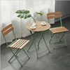 Coffee shop table and chair outdoor plastic wood folding three-piece set of simple Western restaurant furniture leisure balcony furniture