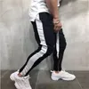 Pantalon de survêtement pour hommes coupe ajustée Hip Hop pantalons de survêtement Streetwear couleur contrastée mode hommes pantalons d'entraînement gymnases bas Fitness