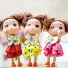 Lindo boneca de menina dos desenhos animados brinquedo, fivela chave 12cm pvc alta simulação, para celebração de casamento, festa garoto 'presente de aniversário, coleta, decotação