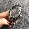 ファッション腕時計ブランド女性のメンズスタイル金属鋼鉄帯クォーツ時計x46