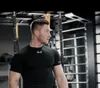 Brand krótki Sudy Suszący Ubrania sportowe męskie ubrania na siłownię ciasny trening koszykówki fitness noś T-shirt Wholle202F