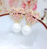 All'ingrosso gioielli orecchini di perle di design per le donne nuovi accessori per orecchini di bellezza splendenti a forma di cuore per la festa