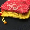 Kinesisk Dragon Silk Brocade Pis Party Favor Bags Small Drawstring Christmas Pouch Candy Presentväska Smycken Förpackning Väskor med fodrade 10st