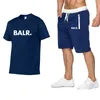 夏のスポーツメンズジャージスポーツウェア T シャツ + パンツランニングショーツセット服スポーツジョガートレーニング BALR フィットネススーツスポーツウェア紳士服