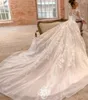 Naviblue Dolly plage robes de mariée Jewel Neck Lace Appliqued Une ligne Glitter à manches longues modeste Cour robe de mariée train Robes de mariée 4289
