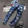 Persoonlijkheid patch vest jeans 2 stuk set heren geborduurde hot stempel denim vest + multi-badge gat slanke rechte jeans sets