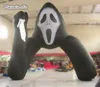 Arco de la muerte inflable de Halloween aterrador personalizado Máscara de calavera de 5 m de altura Hombre volar puerta de entrada Arco del diablo con cuchillo para decoración al aire libre