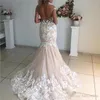 Gorgeous Szampana Koronki Syrenki Suknie Ślubne Sheer Cap Sleeve 3D Flora Aplikacje Backless Suknia Ślubna Suknie Ślubne Vestido de Novia