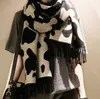 Partihandel-ny vinter varm designer stickad dubbelsidig halsduk tjock luftkonditionering sjal mode tofs imitation cashmere damer halsduk
