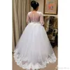 Principessa 2020 Plus Size Dubai Arabo O Collo Abiti da sposa Illusion Back 1/2 maniche Spose Abito in pizzo Appliqued Lunghezza pavimento Abiti da sposa