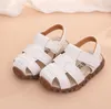 Baby sandaler spädbarn pojkar mjuka botten första walker sommar pus läder baotou strand sandaler toddler mode anti-slip skor skor byp613