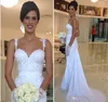 2019 Nya romantiska spaghetti remsor Baklösa brudklänningar Sweetheart Lace Appliques Long Garden Formell Bridal Gown Plus Storlek Anpassad