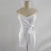 Sexig Ärmlös Låg Klipp Bow Tie Kvinnor Bodysuit 2019 Sommar Sexig Solid Färg V-Neck Ärmlös Spaghetti Strap Backless Playsuit