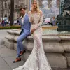 2020 Abiti da sposa a sirena bohémien Pizzo maniche lunghe Collo gioiello Abito da sposa in tulle da spiaggia Abiti da sposa sexy Illusion