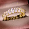 2020 Nueva llegada Joyería de lujo más vendida 925 Plata de ley Relleno de oro Corte ovalado Topacio blanco CZ Diamante Promesa Anillo de boda para mujer