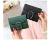 Carteiras de grife Carteira pequena Feminina Curto Retro Fold Change Wallet Vermelho Preto Verde Marrom Cor Pura Quente Mini Bolsas Femininas Preço de Fábrica