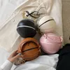Bolsa de mão de basquete de personalidade pequena feminina Bola de correntes Bola criativa Bag de Mensageiro Mensageiro Mini Round Tote240n