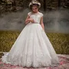 Élégant Une Ligne Dentelle Robes De Fille De Fleur Pour Le Mariage Sheer Jewel Neck Appliqued Pageant Robes Tulle Balayage Train Enfants Robe De Bal