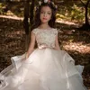 Eleganti abiti da ragazza di fiori champagne appliqu￩ in pizzo senza maniche a cascata per bambini abiti da spettacolo per matrimoni abiti da comunione