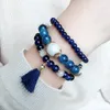 Hot Sale Bohemian Sweet Candy Färg Wild Multi-Layer Elastiska Rope Armband Kvinna Tassel Armband Kvinnor Smycken Tillbehör