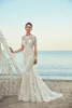 2019 Eddy K Mermaid Wedding Dresses Jewel Neck Hollow Back Lace Appliqued Sweep Train Beach Wedding Dress Long Sleeve Robe De Mari231V