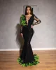 2019 czarne długie rękawy suknie balowe Sexy przepuszczalność Sheer głębokie V Neck suknie syrenka pióro koronkowe aplikacje suknie na konkurs piękności