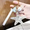 Starfish Keychain Couple Key Ring Shell Crafts Pearl Key Chains Lady Bag Pendant Necklace Light Bulb Ribbon Car Trendy Jewelry1921661