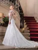 Eleganckie pełne koronki Suknie ślubne Vestidos de Noiva V Neck Sheer Długie Rękawy Tulle Aplikacja Plus Size Sukienka ślubna Suknie ślubne