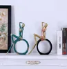 創造的な樹脂読書少女置物の装飾品ヨーロッパの女性ミニチュア家具デスクトップ工芸品の家の装飾誕生日プレゼント