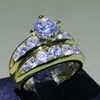 Commercio all'ingrosso Wieck gioielli di lusso in oro sterling 925 forma rotonda topazio bianco diamante CZ coppia anelli anello nuziale nuziale impostato per le donne regalo