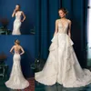 New Arrival Sheer Neck Wedding Dresses with Detachable Train Lace Applique See Through Back 2019 Custom Made Overskirts Bridal Gowns