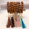 2020 hot sale handmade wholesale stretched beaded keyring trendy popular elastic large wooden beads bracelet tassel keychain