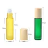 10ml Essential Oil Roller Ball Bottle Matte Färgglada Träkornskydd Portabel Bekvämlighet Frostat Tjock Glasfyllningsbar Container JXW319