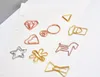 33 Style Mini Metal Papper Klipp Guld Ovala Plommon Blossom Triangle Papper Klipp Bokmärke Memo Planner Klipp Skolkontor Stationery Supplies