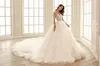 2020 Ball Gown Wedding Dresses Jewel Long Sleeves Lace Appliques Castle Bridal Gowns Custom Made Button Back Sweep Train Wedding Dress