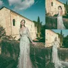 I più nuovi abiti da sposa a sirena della Boemia Corona Borealis a maniche lunghe in tulle con applicazioni di pizzo Abiti da sposa Sweep Train robe de mari￩e