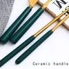 Vintage groene keramische handgreep Flatare Set Gold Crainless Steel Spoon Fork Knife Mes Set met opberghouder Caddy Jar