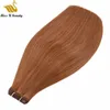 Trama de cabello ultra fino Trama de cabello humano muy suave Cinta de seda Extensiones de cabello de trama plana 2 paquetes Brwon Rubio Color rojo vino