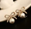 Fashion exquisite zircon bow pearl Stud earrings highgrade 18K goldplated hypoallergenic female cute girl earrings9125697