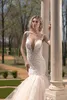 Naama Anat Champagne Mermaid Wedding Dresses Deep V Neck Illusion Back Appliques Beads Lace Sweep Train Wedding Dress Bridal Gowns