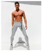 AQUX 2019 Mens Dry rapide Sweat Pantalons longs Tight Pants Sexy Men Fashion pleine longueur Pantalons Hommes Casual Crayon Sweatpants stretch