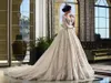 Rami Salamoun Luxe Une Ligne Robes De Mariée Col En V Illusion Appliques Demi Manches Robe De Mariée Vintage Dos Nu Dubaï Arabe Robes De Mariée
